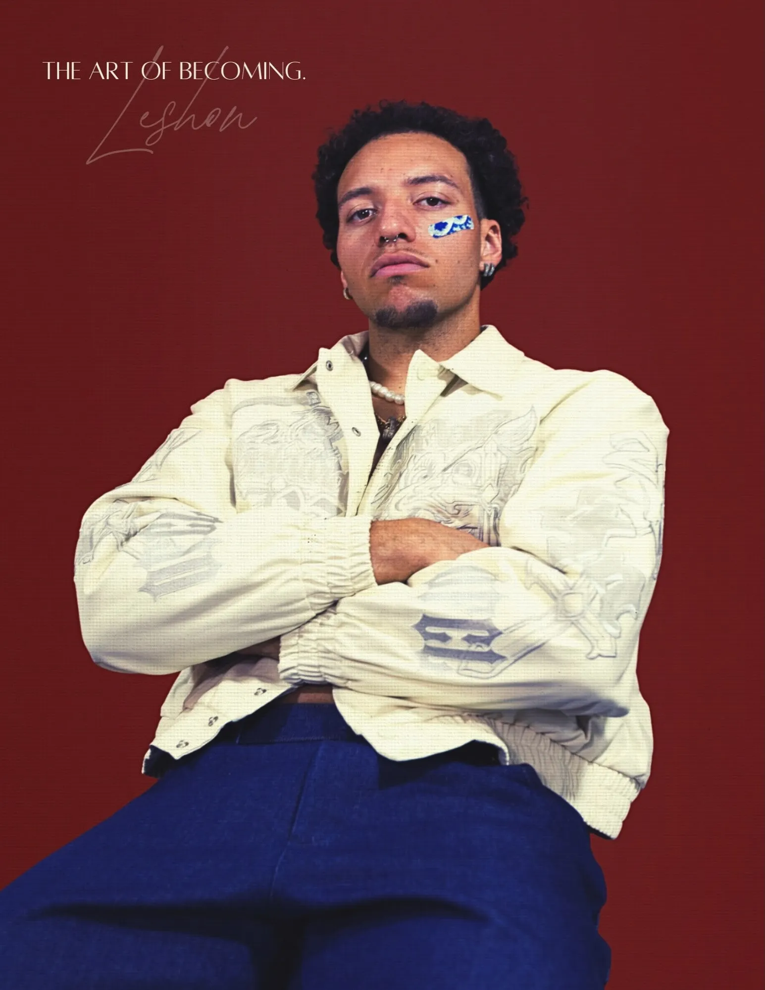 Sacramento R&B artist Leshon in a cream jacket on a deep red cover titled The Art of Becoming